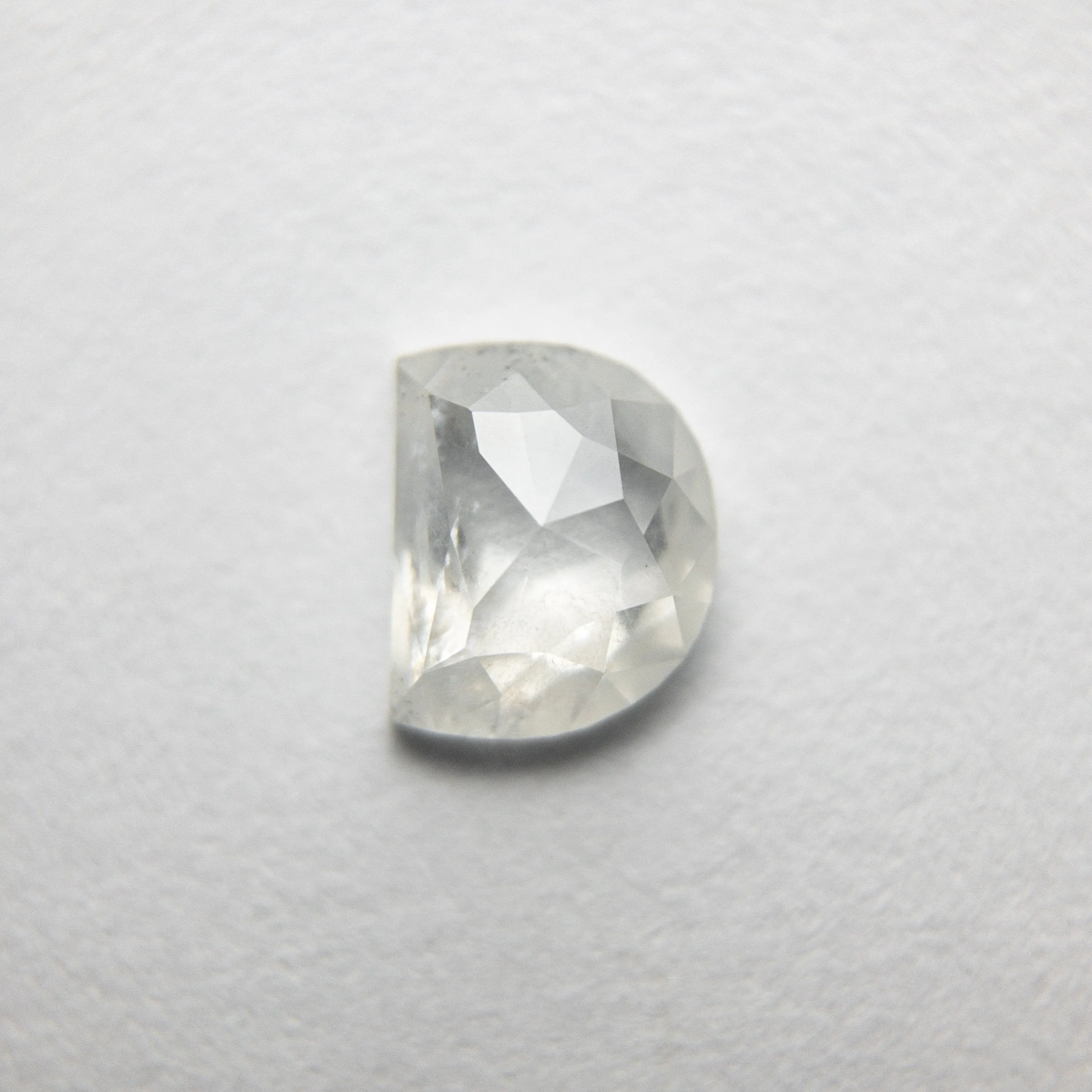 0.61ct 5.72x4.66x2.17mm Half Moon Rosecut 18351-16 hold D1975