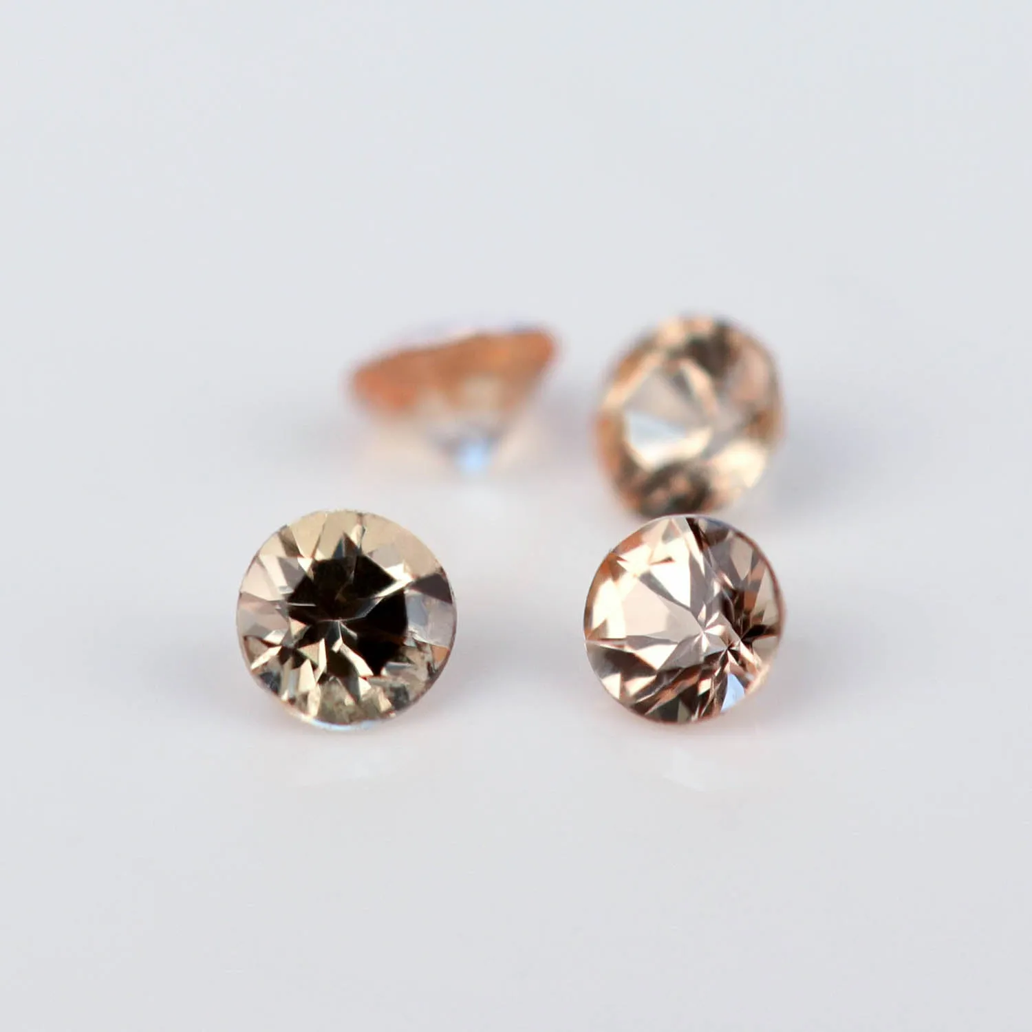 1.5mm Round Lab-grown Padparadscha Sapphires - 112015