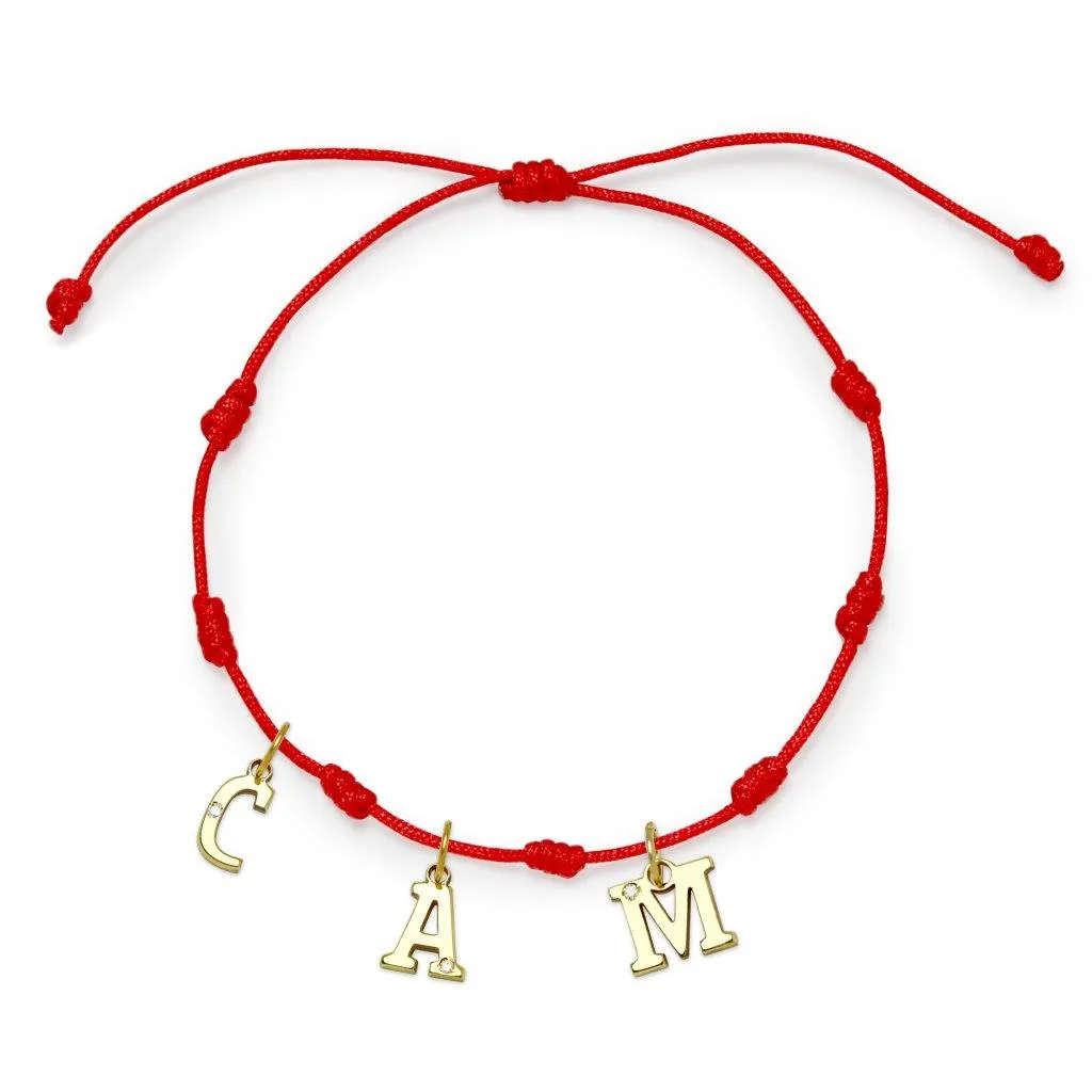 Pulsera con Inicial 7 nudos Rojo 3 letras con Diamante y Oro